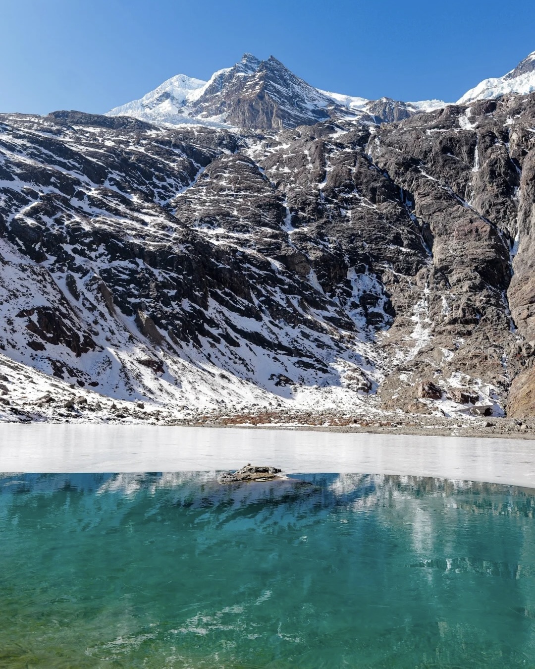 Snow-covered alpine terrain on the Yubeng winter trek under Meili Snow Mountain — hero image for the Yubeng Trek by Boutique China
